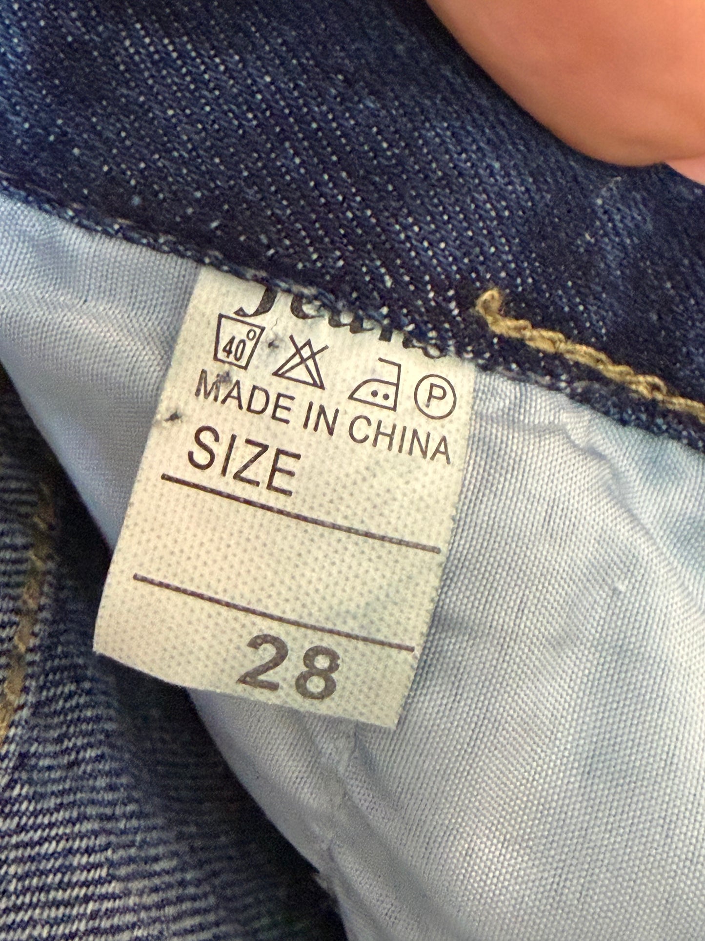 Wide-Leg Pleated Jeans