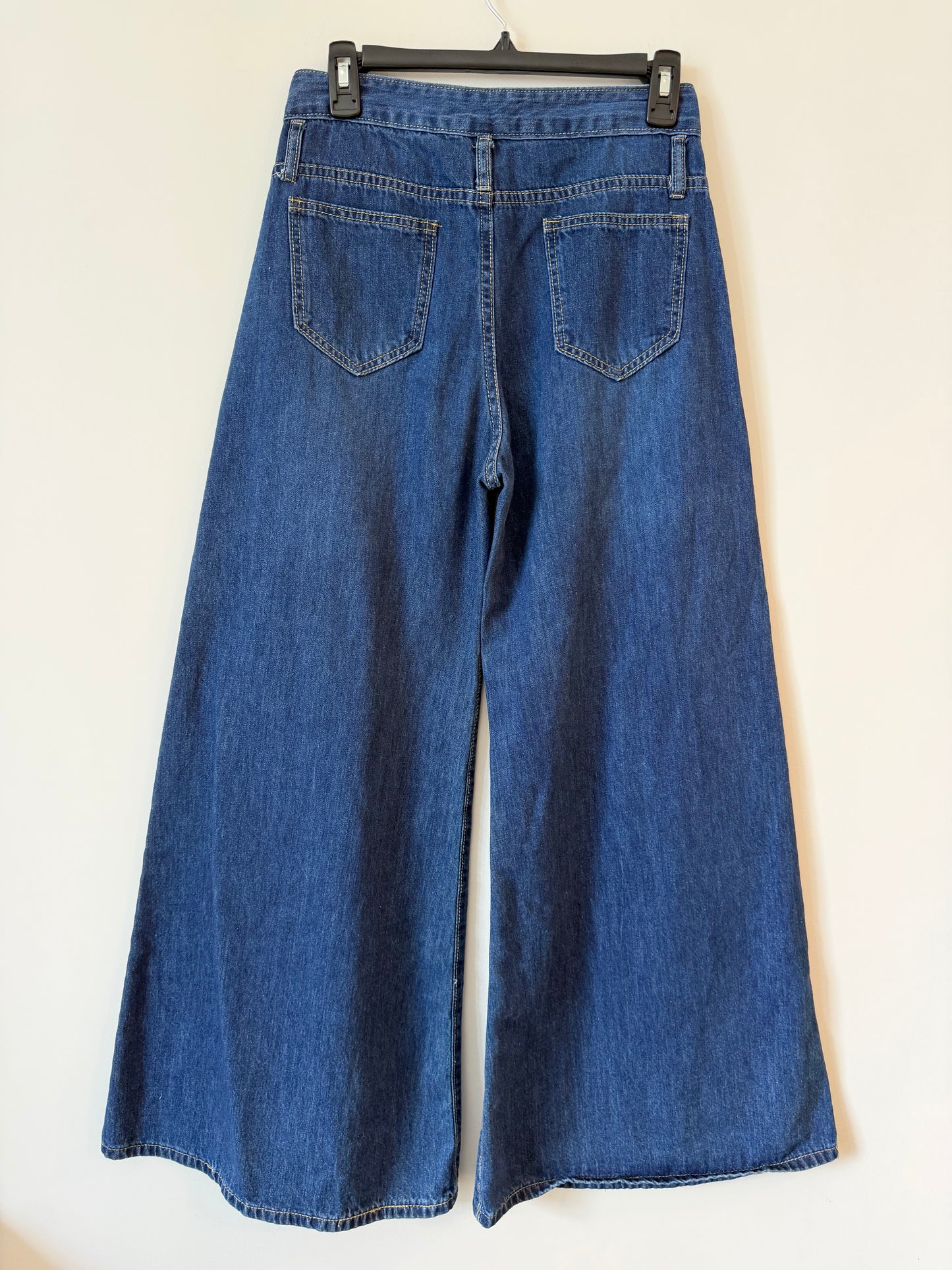 Wide-Leg Pleated Jeans