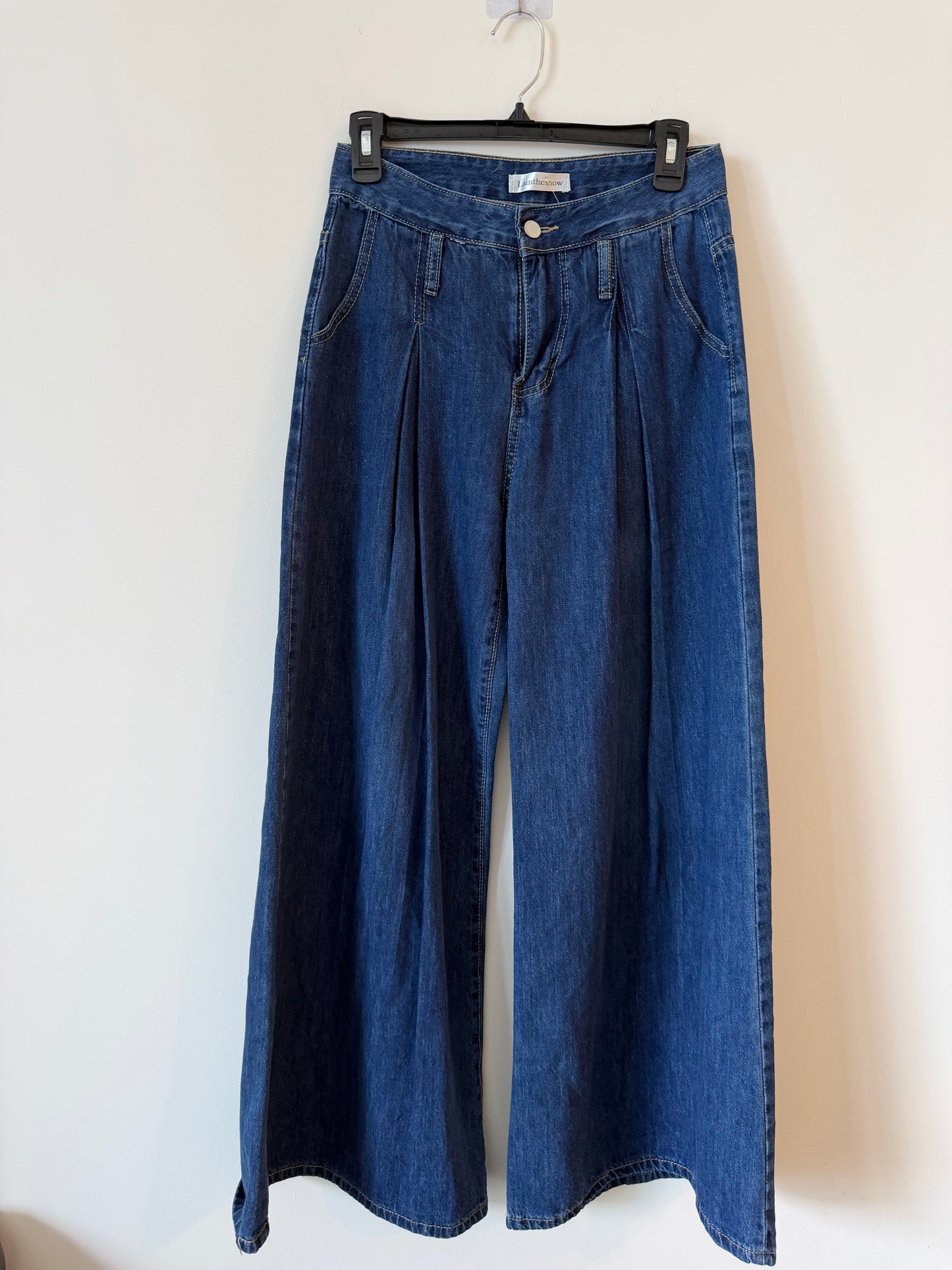 Wide-Leg Pleated Jeans